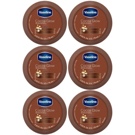 Vaseline front packaging showing six travel-size tubs and cocoa glow benefits