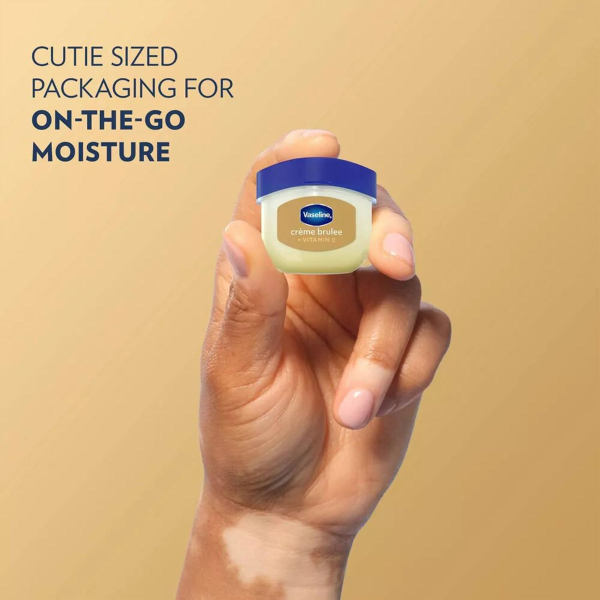 Hand holding Vaseline jar demonstrating quick, mess-free application while traveling