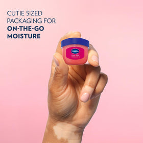 Vaseline jar tucked in a purse pocket for on-the-go moisturizing convenience