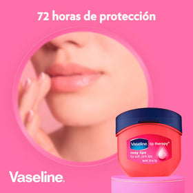 Vaseline tin beside coin showing compact 0.25 oz travel size