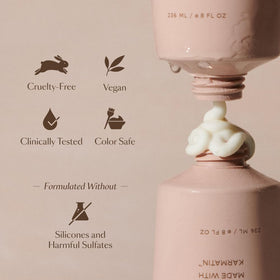 VEGAMOUR bottle paired with matching shampoo for a complete routine