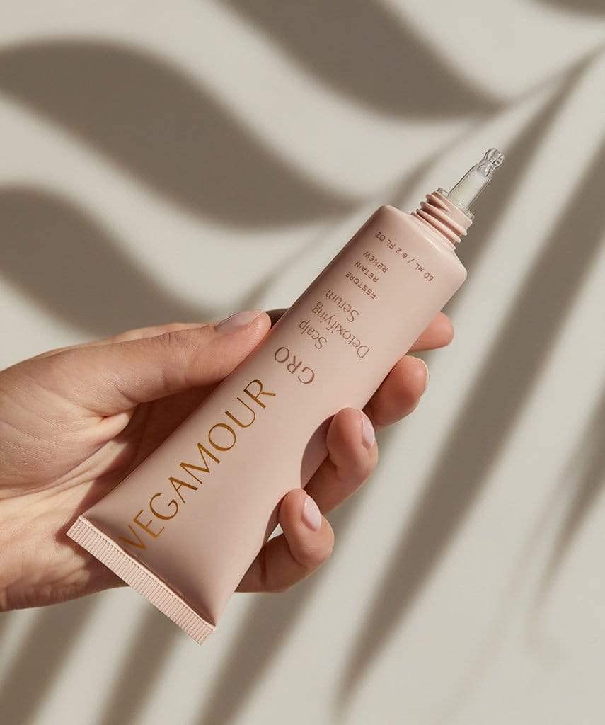 VEGAMOUR serum staged in bathroom routine showing easy weekly use benefit