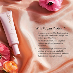 VEGAMOUR hand applying serum to scalp for targeted buildup removal benefit