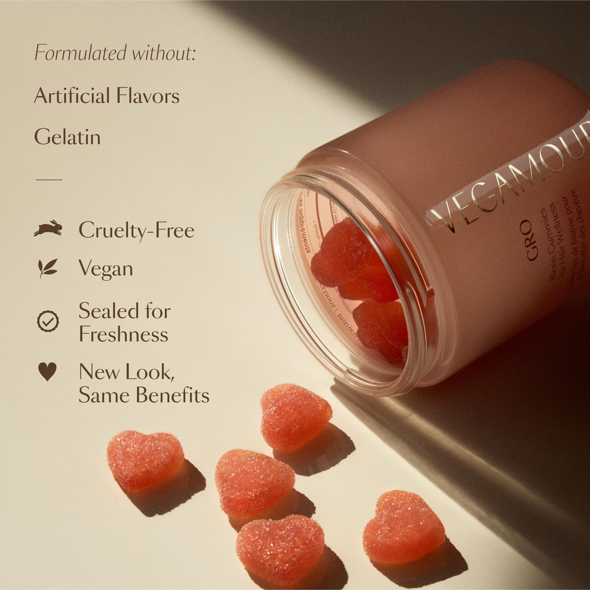 VEGAMOUR jar staged with fresh strawberries portraying natural flavor appeal
