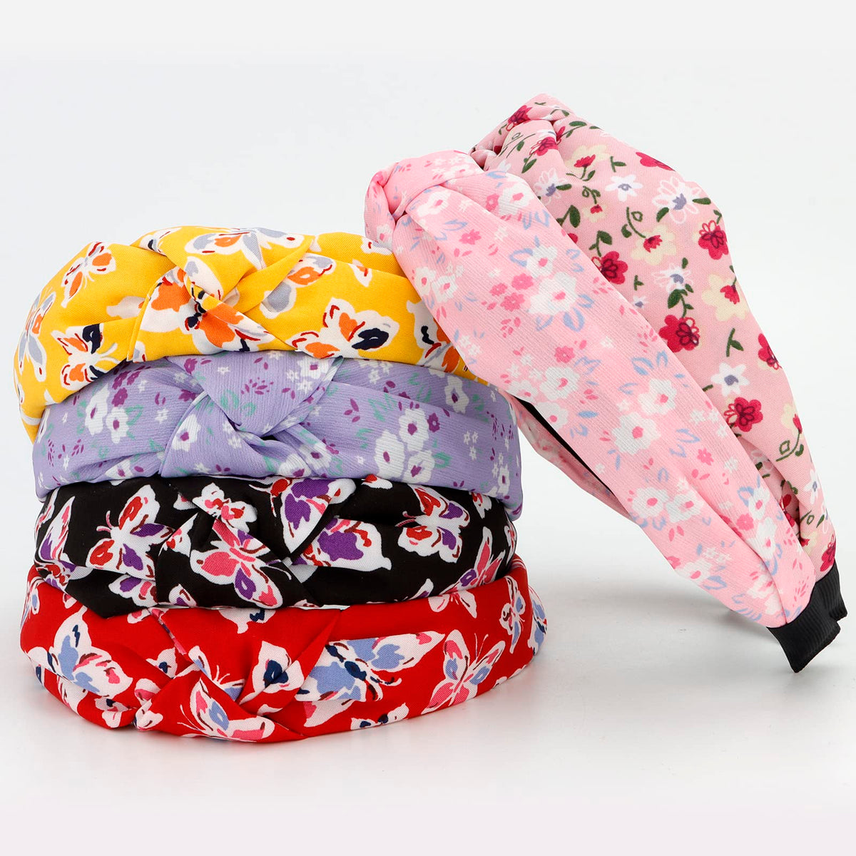 VELSCRUN headband held in hand to show size and one-size fit benefit