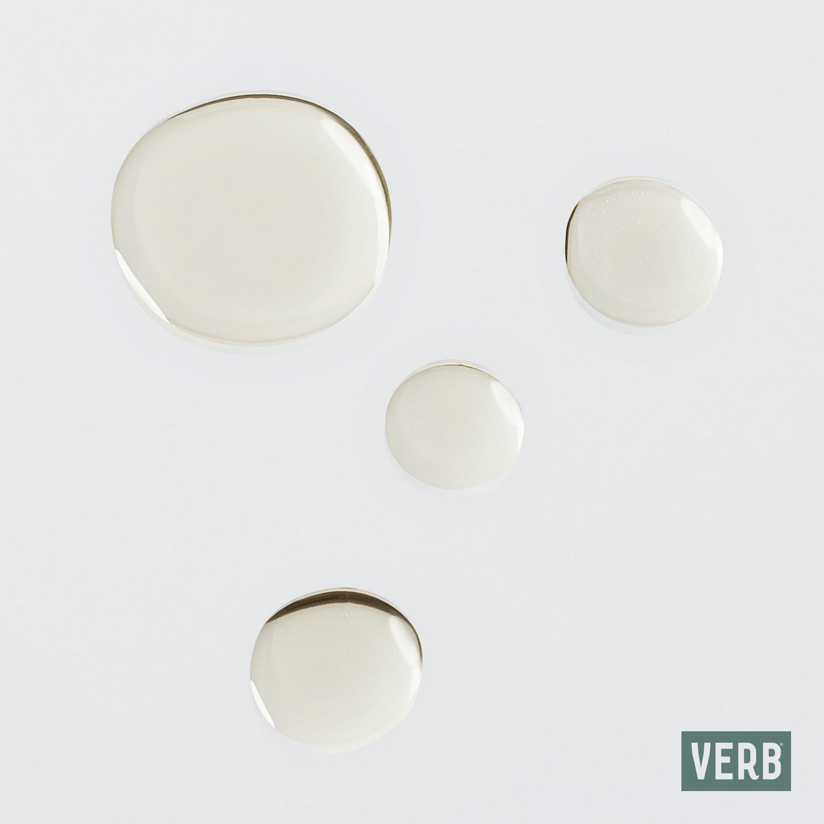 VERB curl oil used on dry hair to refresh curls and reduce frizz
