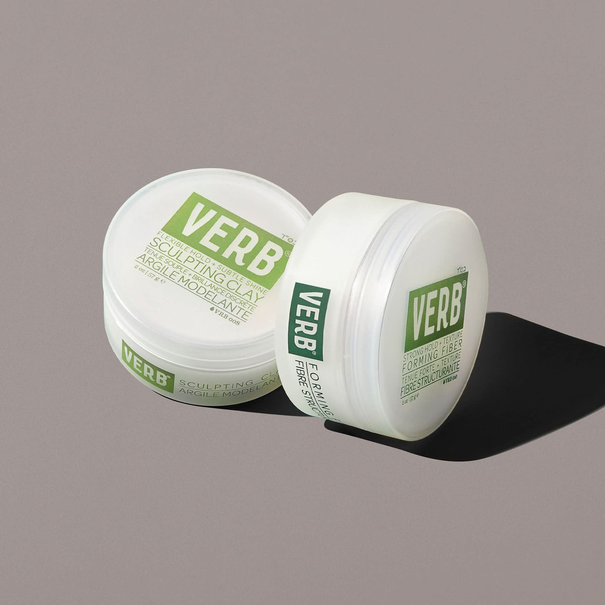 Styling damp hair with VERB sculpting clay for a sleeker, structured finish