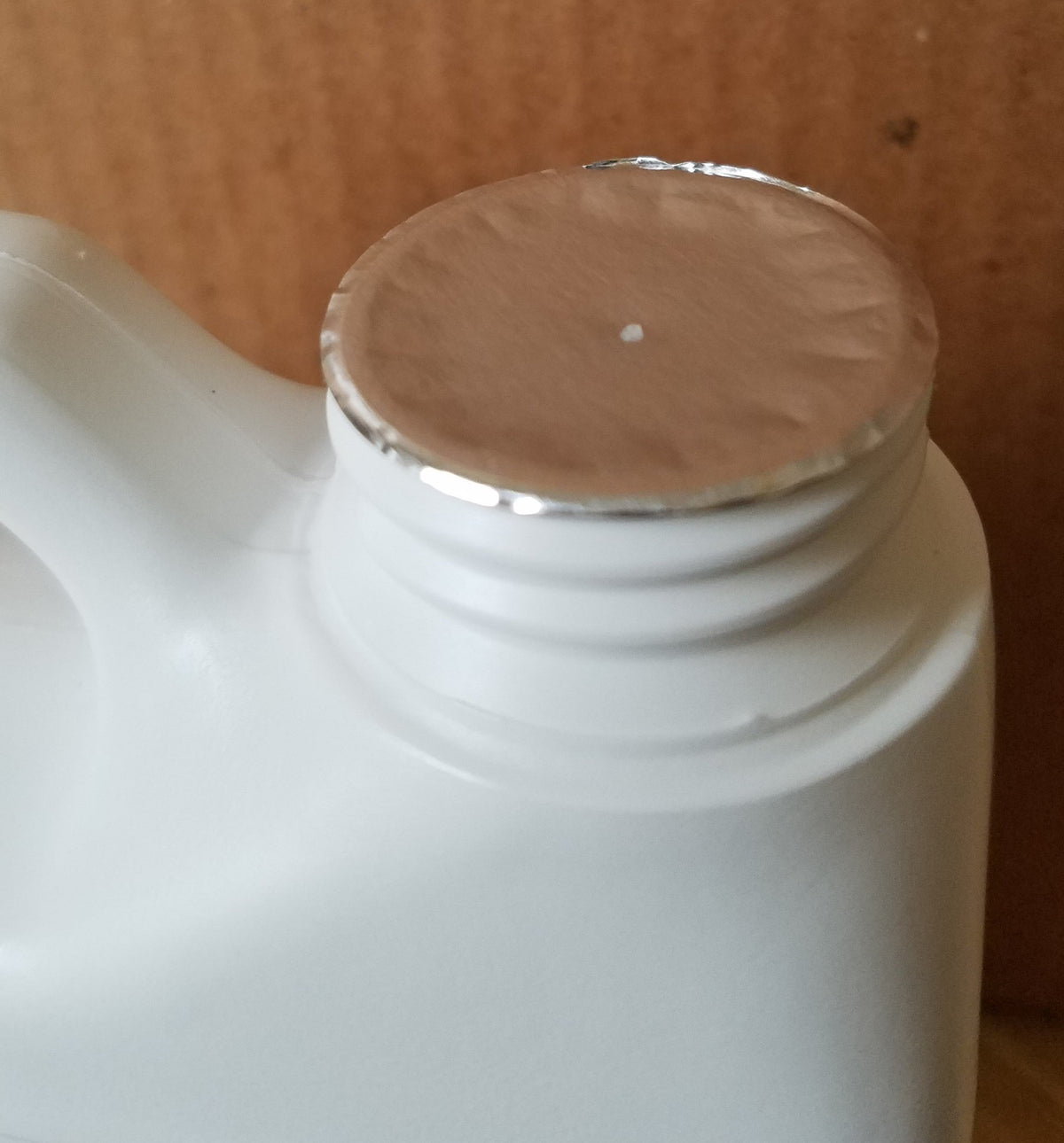 Verdana neem oil label detail displaying organic cold-pressed claims and assurance