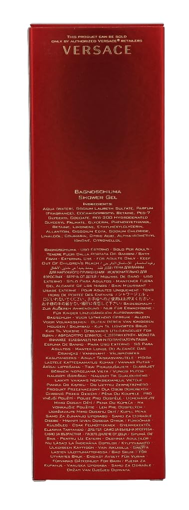 Versace Eros Flame beside common items showing 8.4 oz scale for travel convenience