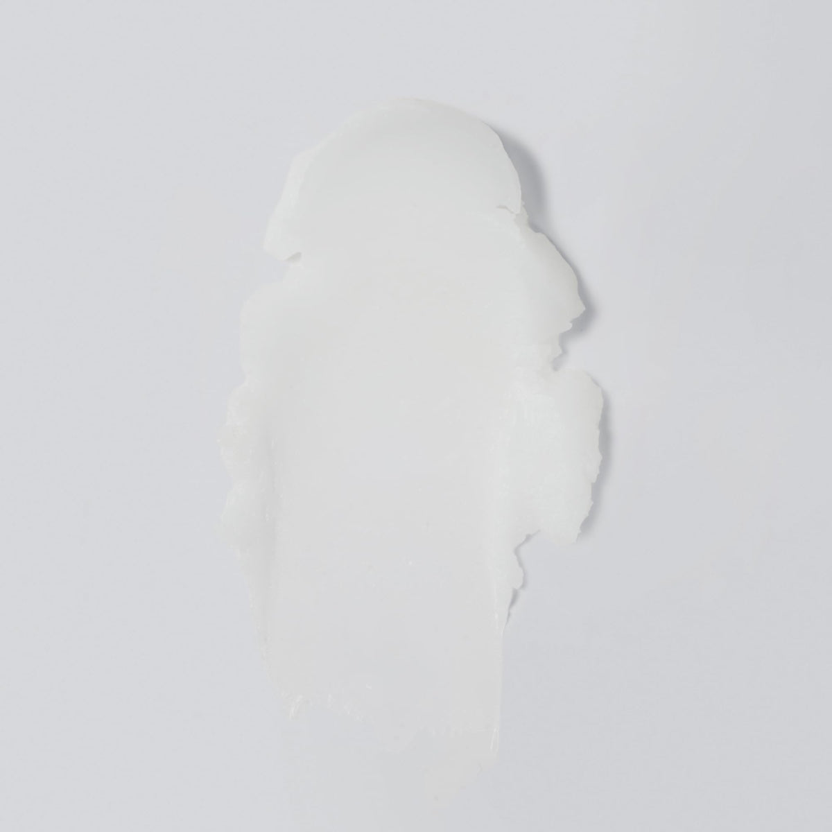 Versed Day Dissolve open jar close-up of balm texture, highlights smooth melting consistency