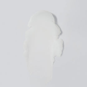 Versed Day Dissolve open jar close-up of balm texture, highlights smooth melting consistency