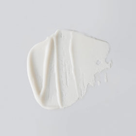 Versed Day Maker close-up of creamy microcrystal texture highlighting gentle exfoliation benefits