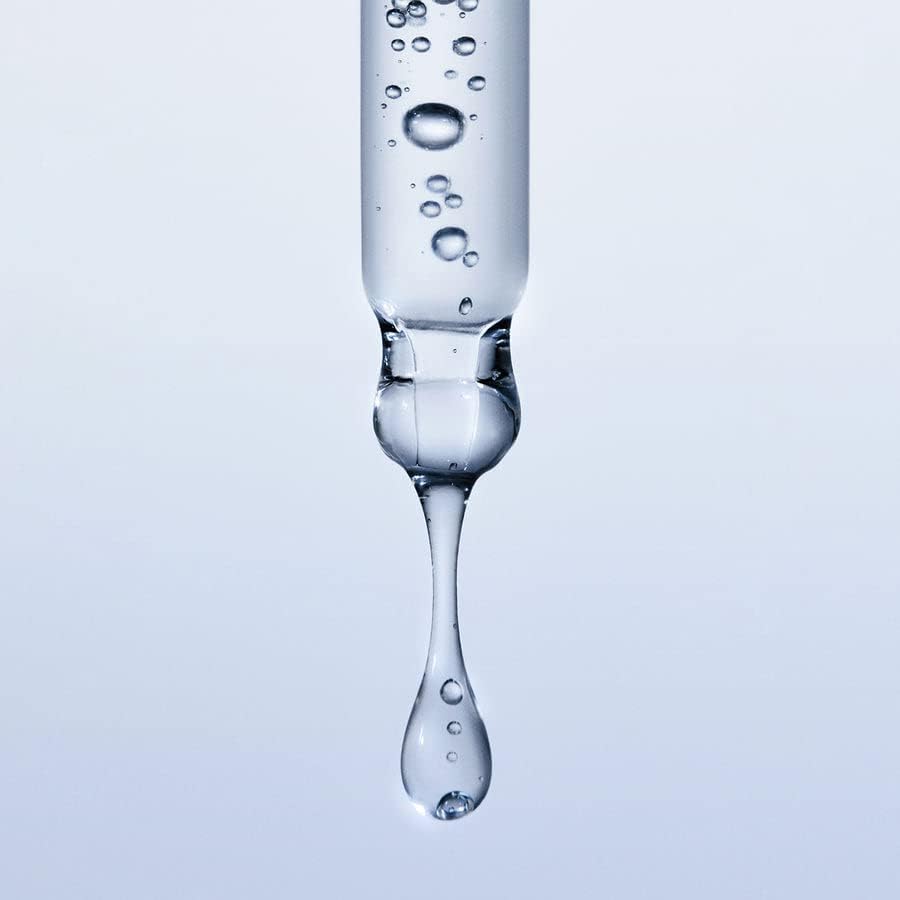 Versed Moisture Maker 1oz bottle next to common object showing compact travel-friendly size