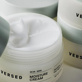 Versed jar in hand demonstrating easy application and quick absorption