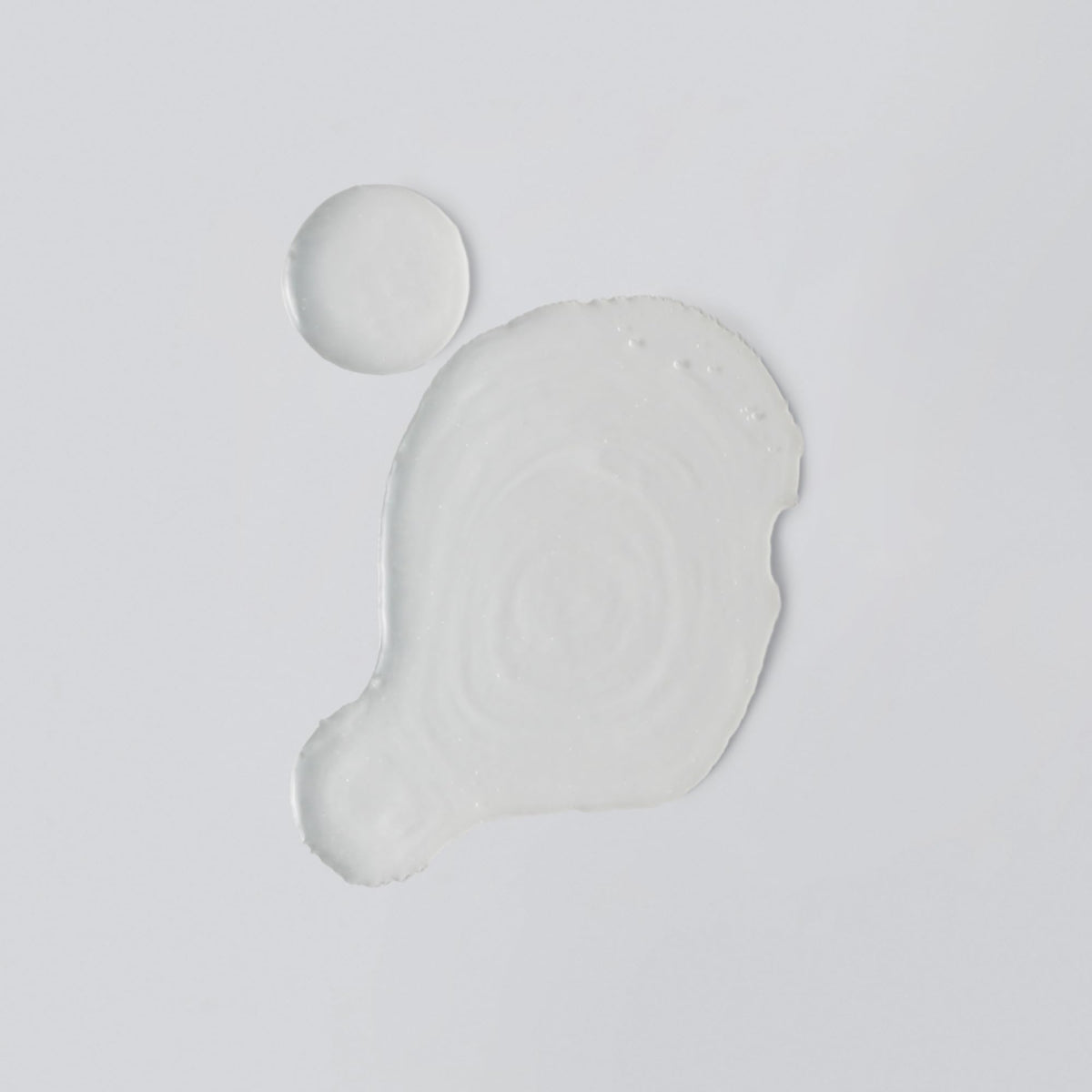 Versed milky toner texture close-up illustrating lightweight absorption benefit