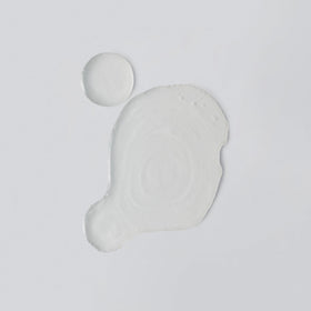 Versed milky toner texture close-up illustrating lightweight absorption benefit