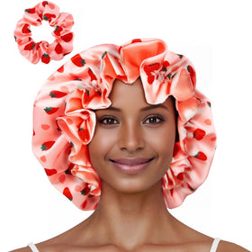 Vettres bonnet front view showing pink strawberries print and secure fit