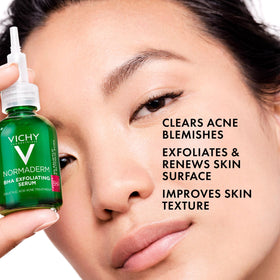 Vichy serum dropper dispensing clear texture, highlights quick absorption benefit
