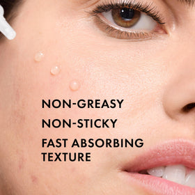 Vichy serum bottle next to moisturizer, demonstrates layering benefit