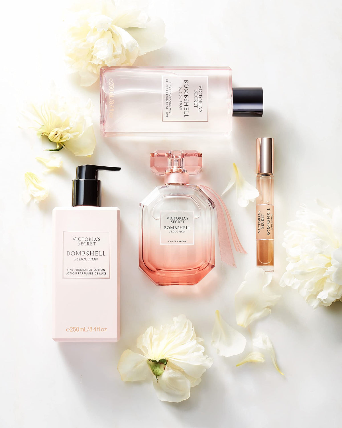 Victoria's Secret lotion paired with perfume and mist showing layering benefit