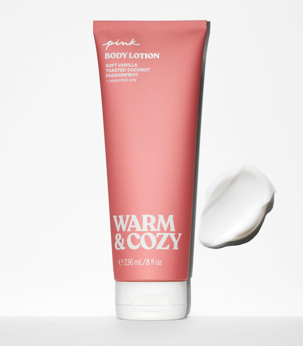 Victoria's Secret PINK lotion texture close-up on pump, highlights smooth absorbency