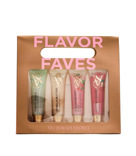 Victoria's Secret hand holding lip gloss set illustrating compact size and travel-ready convenience