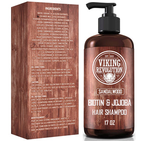 Viking Revolution bottle beside a hand for 17 oz size comparison