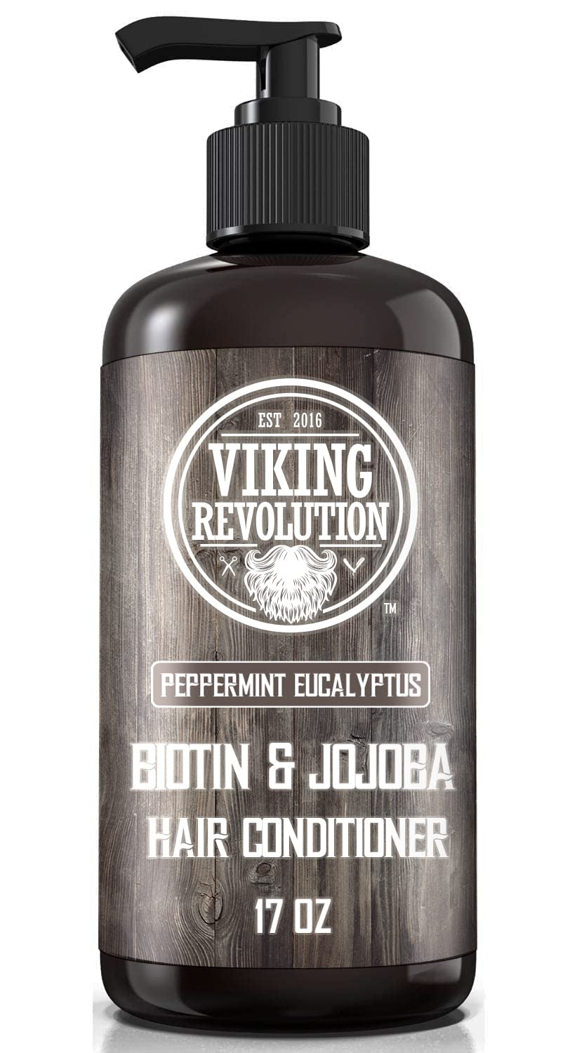 Viking Revolution 17 oz bottles in hand for scale and easy handling