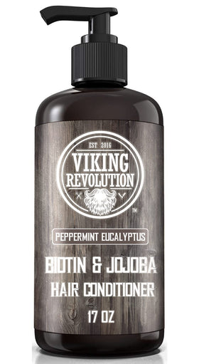 Viking Revolution 17 oz bottles in hand for scale and easy handling
