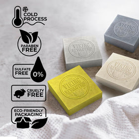 Viking Revolution soap bars held in hand to show size and travel convenience