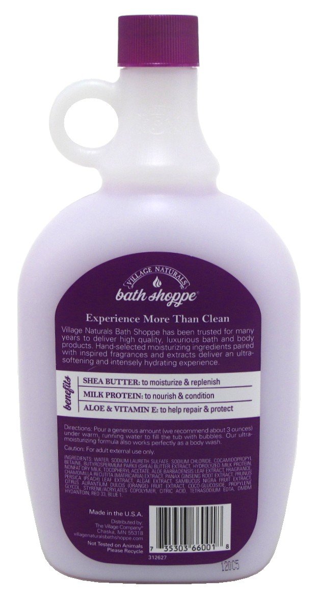 Village Naturals Therapy bottle beside bathtub demonstrating relaxing at-home soak
