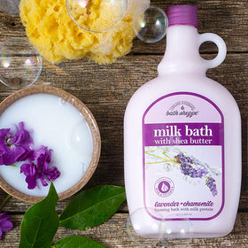 Village Naturals Bath Shoppe milk bath in tub creating bubbles for relaxing soak