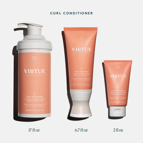VIRTUE applying conditioner to curly hair illustrating detangling and frizz control benefits
