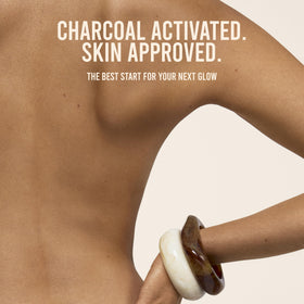 VITA LIBERATA creamy charcoal texture close-up showing exfoliating action