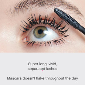 Vivienne Sabó mascara next to coin showing compact travel-friendly size