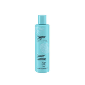 Viviscal shampoo pouring from bottle showing gentle foam for lightweight cleanse