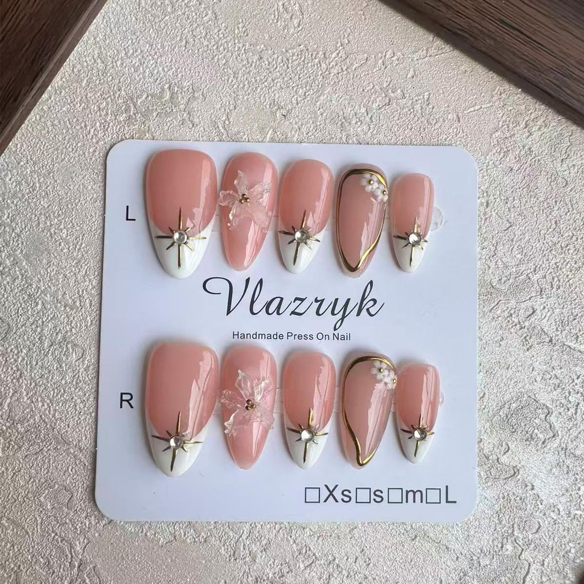 Vlazryk rhinestone cluster focus showing sparkle for event-ready nails