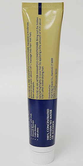 VO5 1.5 oz bottle next to a hand showing compact size
