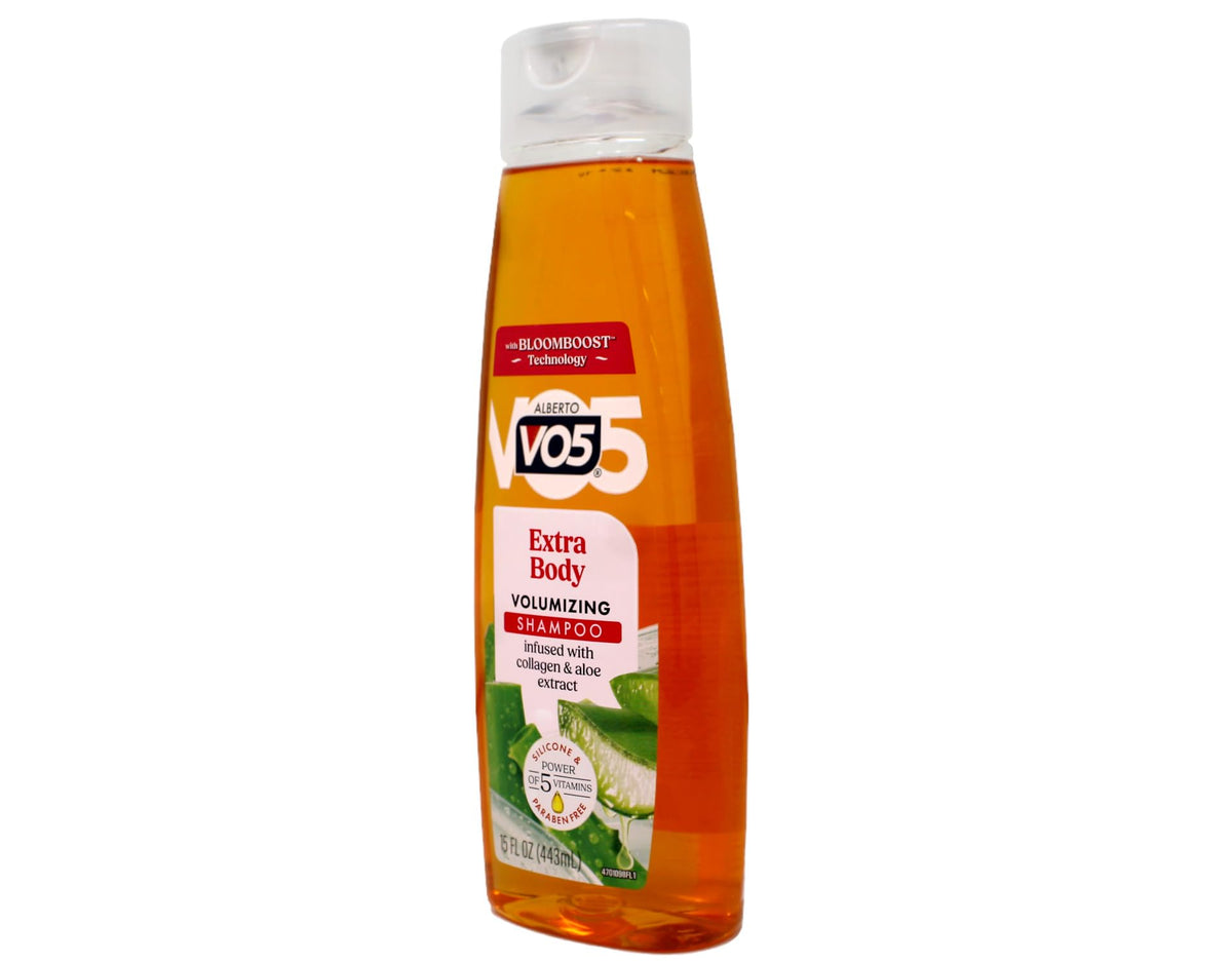 VO5 extra body size comparison in hand demonstrating 15 oz bottle scale