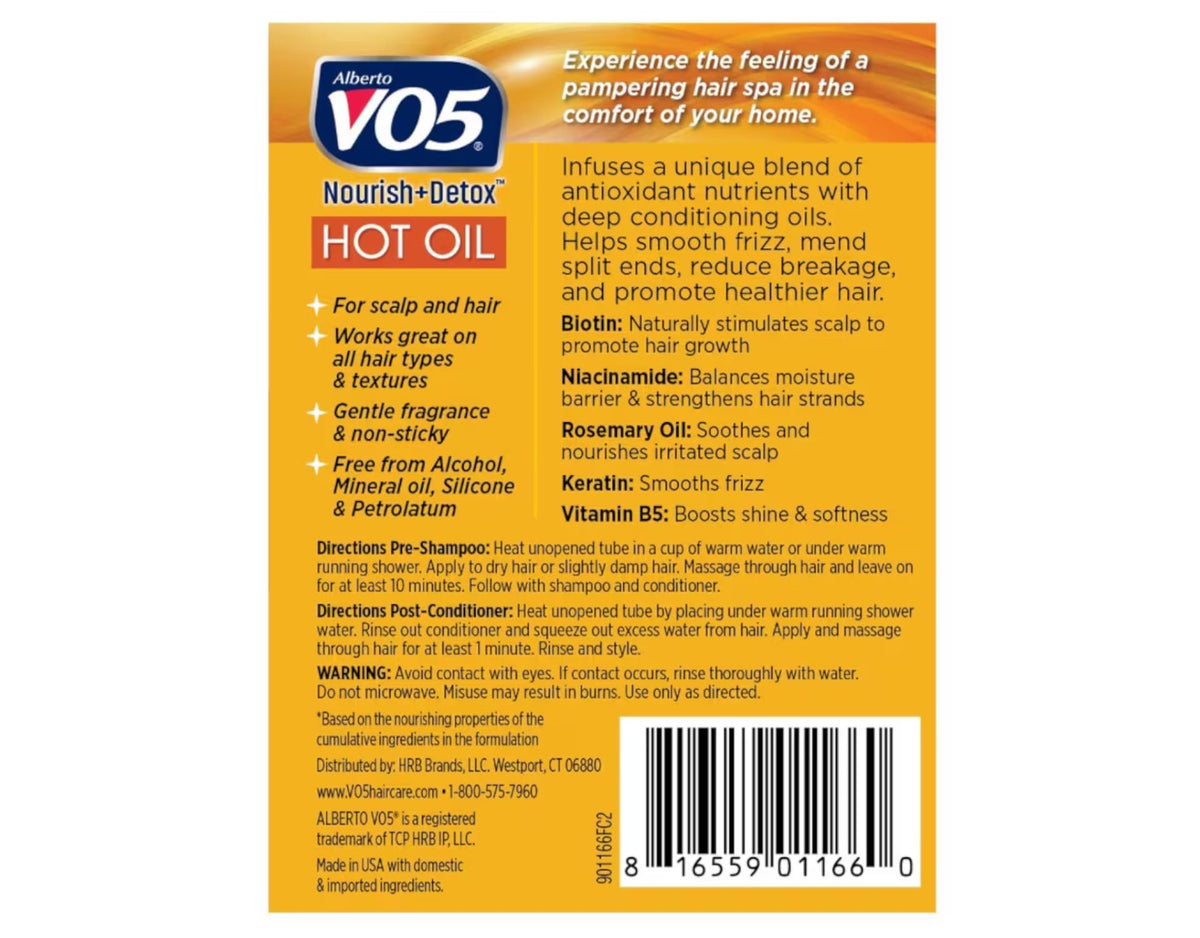 VO5 open packet pouring hot oil therapy treatment onto palm for easy application