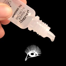 Vogen CAT Magic Primer next to a hand for scale showing travel-friendly kit advantage