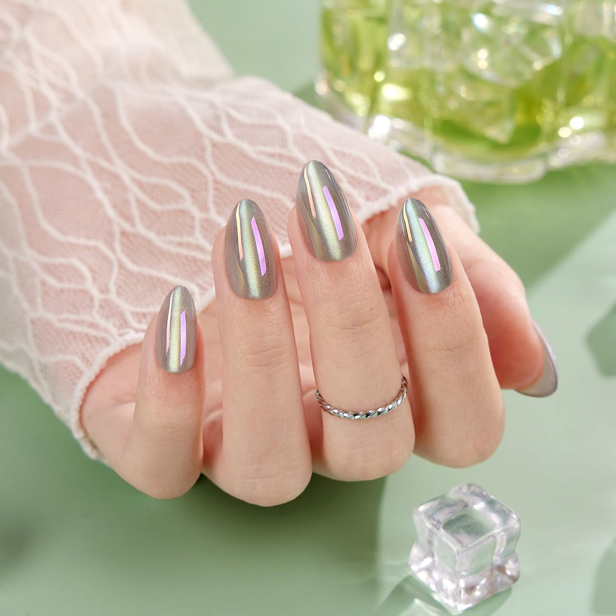 VSALON close-up of nail surface texture showing mermaid chrome shimmer and luminous depth