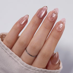 VSALON cuticle oil bottle beside nails showing nourishing maintenance
