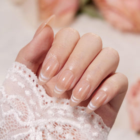 VSALON nails in hand to show size and realistic scale for easy selection