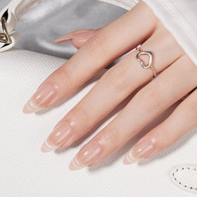 VSALON nail being applied demonstrating easy at-home manicure benefit
