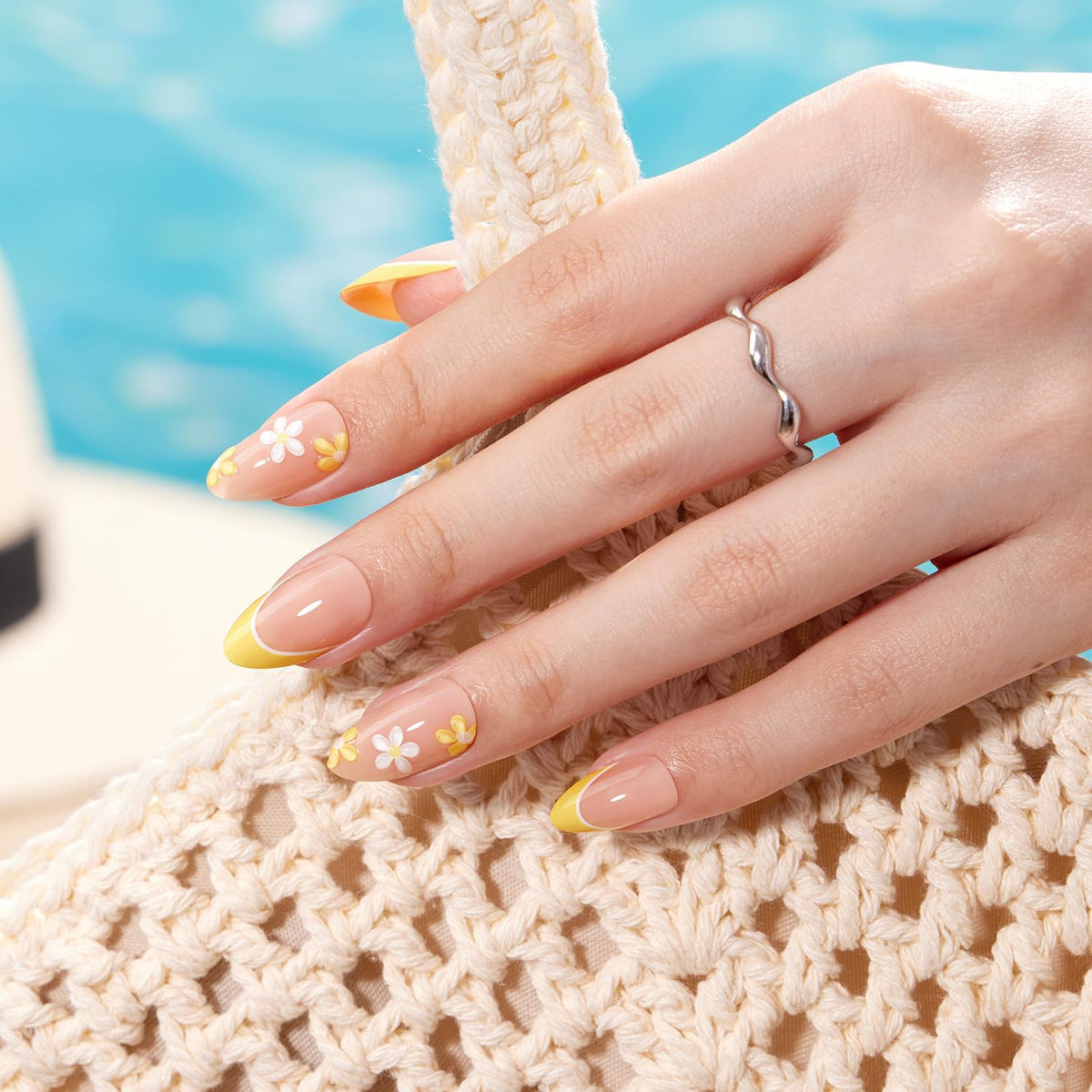 VSALON scale comparison on a model hand showing short length and realistic fit