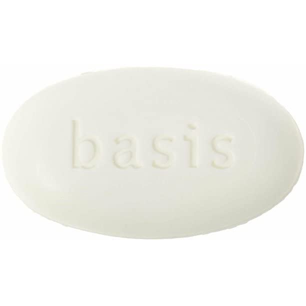 Vxoyo Basis bar in use lathered on hands demonstrating gentle cleansing and easy rinsing