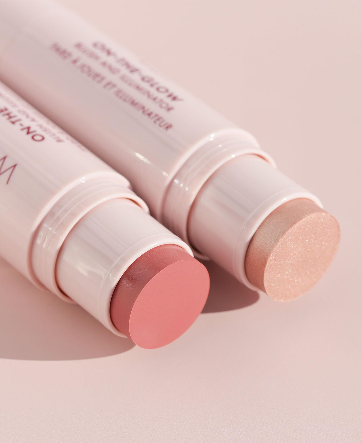 Wander Beauty dual-ended Bare/Nude Glow stick displaying blush and illuminator for versatile use