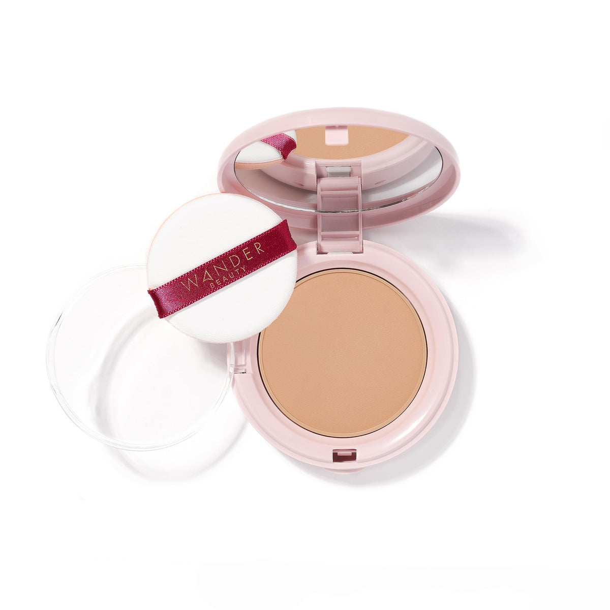 Wander Beauty compact front showing product branding and slim design benefit