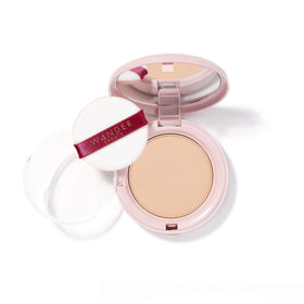 Wander Beauty compact front view showing sleek packaging and portability benefit